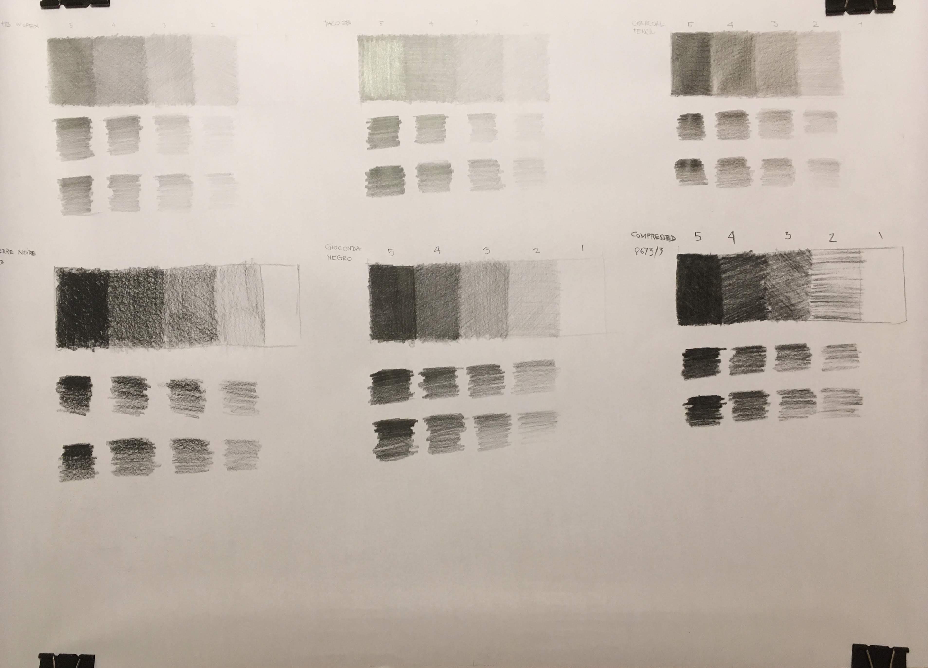 Value charts on white wrapping paper